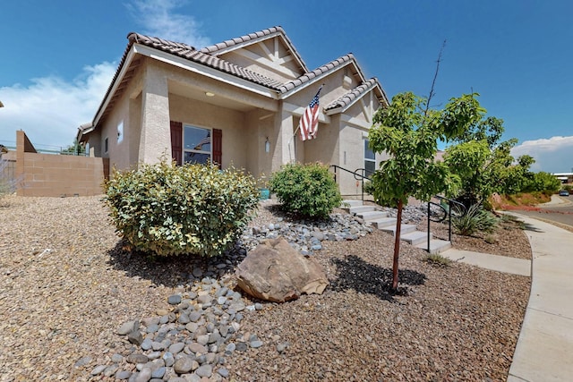 805 Palo Duro Dr, Bernalillo, NM 87004 - view of front of house with stucco siding and a tiled roof