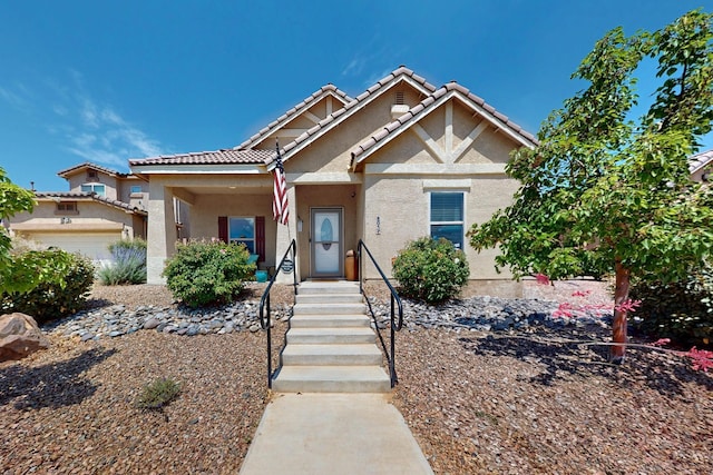 805 Palo Duro Dr, Bernalillo, NM 87004 - view of front facade featuring stucco siding and a tiled roof