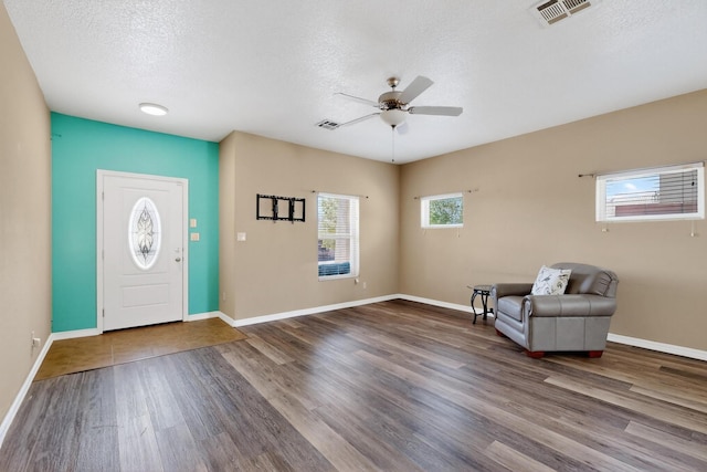 805 Palo Duro Dr, Bernalillo, NM 87004 - foyer with a ceiling fan, wood finished floors, a textured ceiling, and baseboards