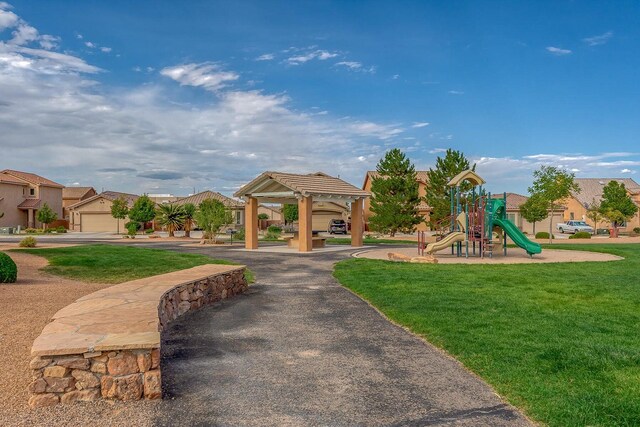 805 Palo Duro Dr, Bernalillo, NM 87004 - community play area featuring a lawn, a gazebo, and a residential view