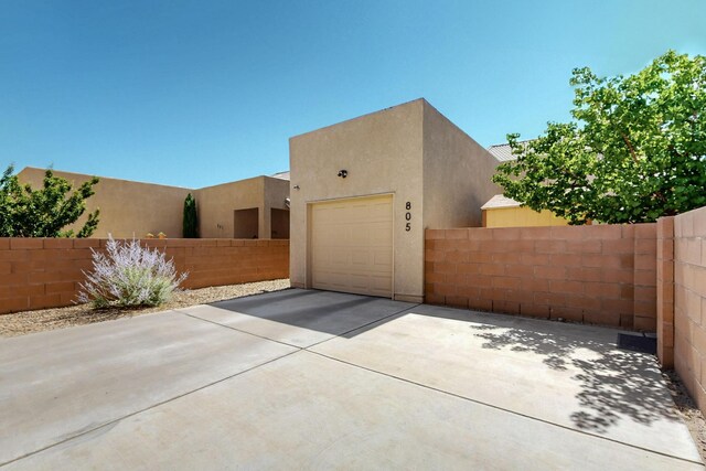 805 Palo Duro Dr, Bernalillo, NM 87004 - garage with concrete driveway