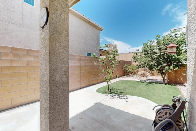 805 Palo Duro Dr, Bernalillo, NM 87004 - fenced backyard with a patio area