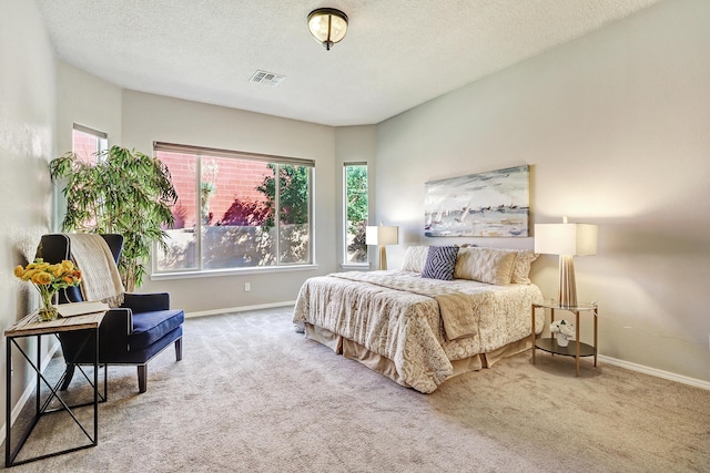 843 Mesa Roja Trl NE, Rio Rancho, NM 87124 - carpeted bedroom featuring multiple windows, baseboards, and a textured ceiling