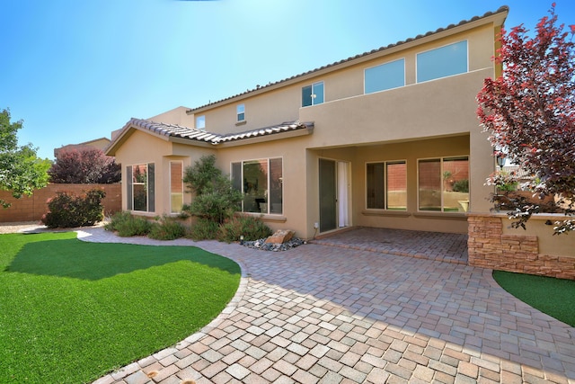 843 Mesa Roja Trl NE, Rio Rancho, NM 87124 - rear view of property featuring stucco siding, a patio, and a tiled roof