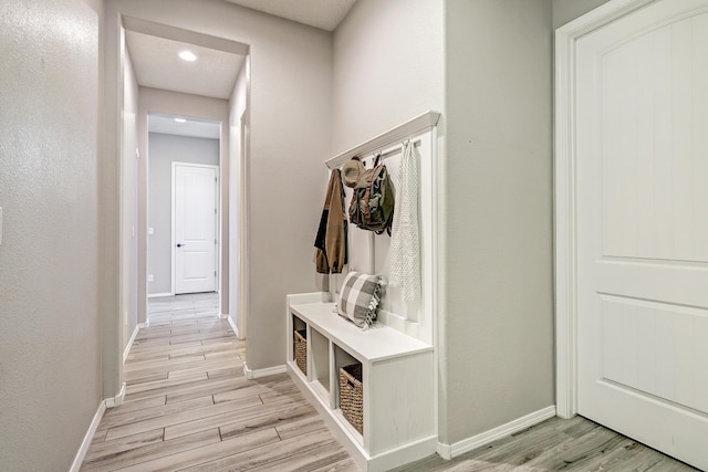843 Mesa Roja Trl NE, Rio Rancho, NM 87124 - mudroom featuring light wood-style flooring, baseboards, and recessed lighting