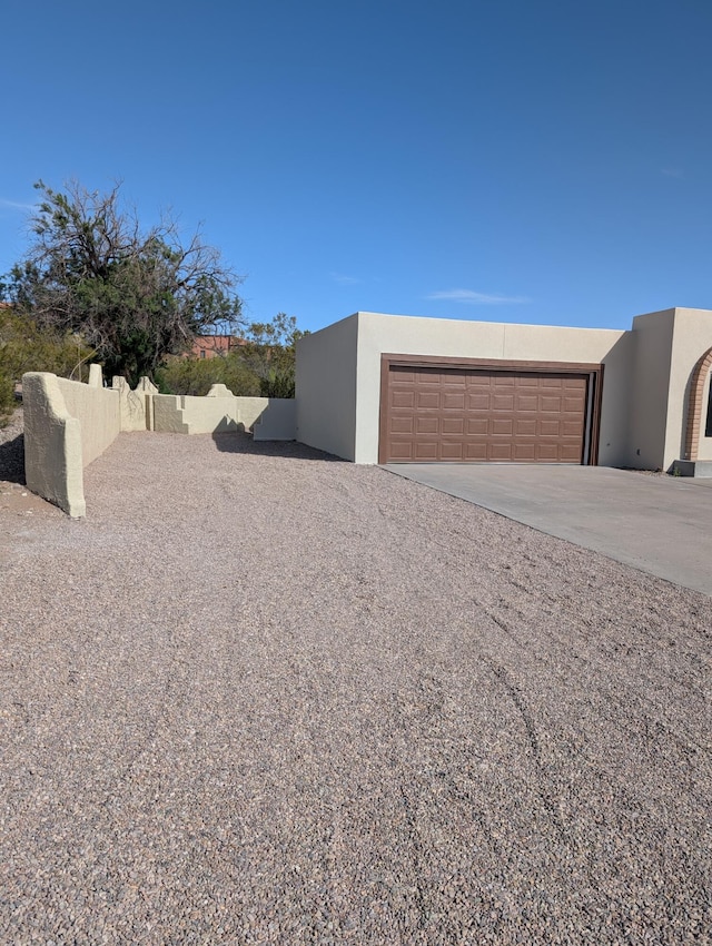 301 Stagecoach Dr, Elephant Butte, NM 87935 - garage with concrete driveway