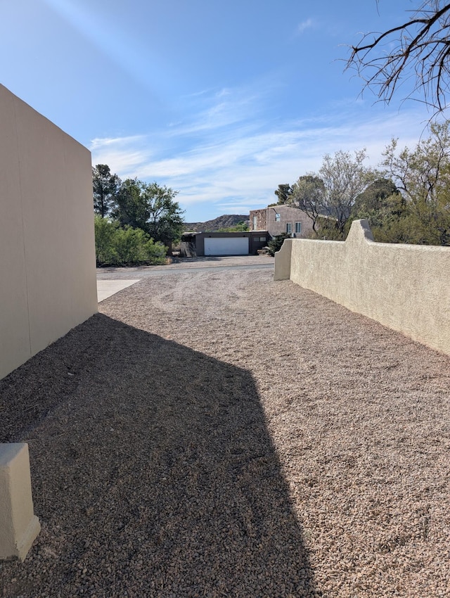 301 Stagecoach Dr, Elephant Butte, NM 87935 - view of yard featuring driveway