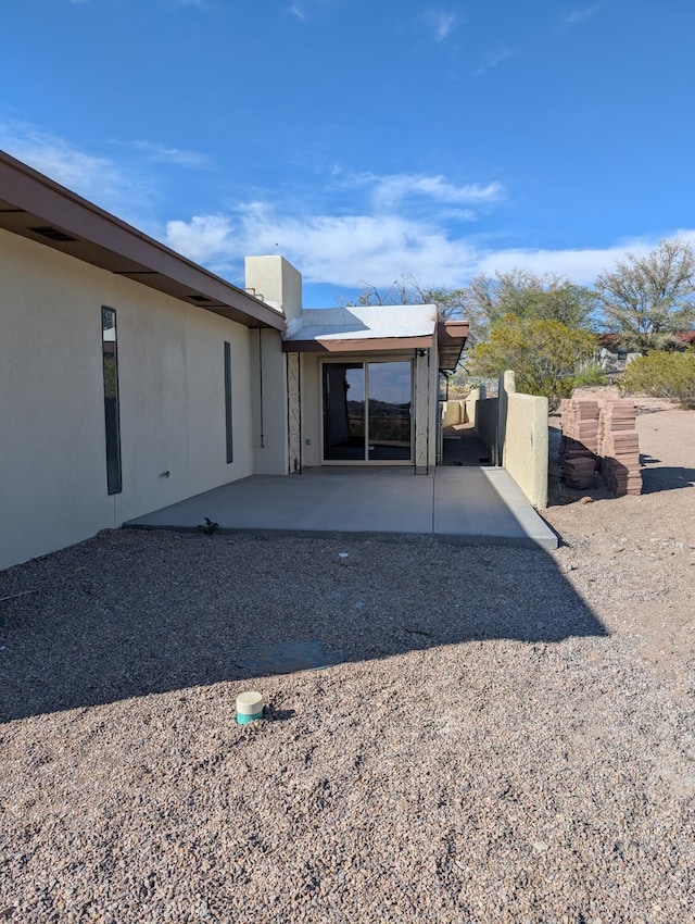 301 Stagecoach Dr, Elephant Butte, NM 87935 - rear view of property featuring a patio and stucco siding