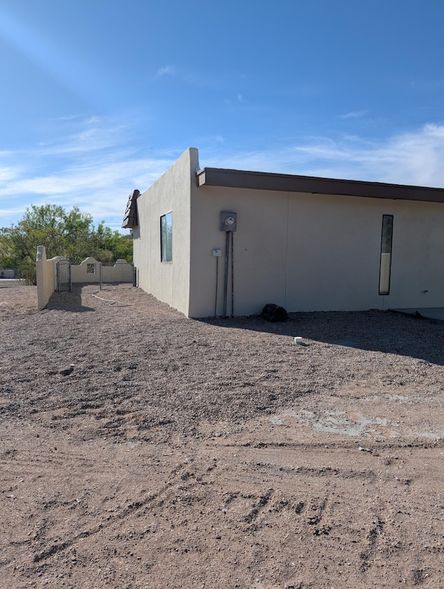 301 Stagecoach Dr, Elephant Butte, NM 87935 - view of property exterior featuring stucco siding