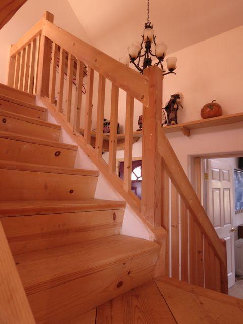 403 Candy Kitchen Rd, Ramah, NM 87321 - stairs with a chandelier
