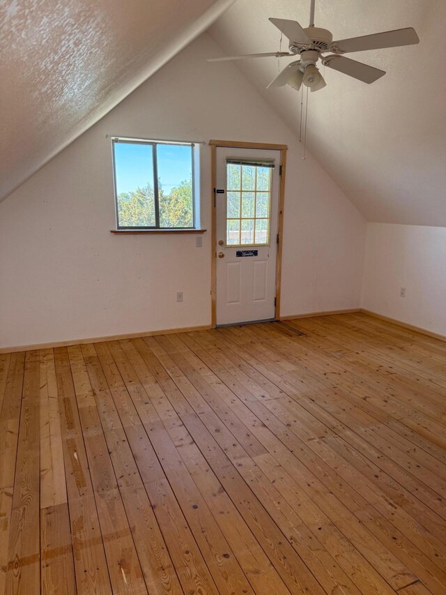 403 Candy Kitchen Rd, Ramah, NM 87321 - additional living space with light wood-type flooring, a ceiling fan, lofted ceiling, and baseboards
