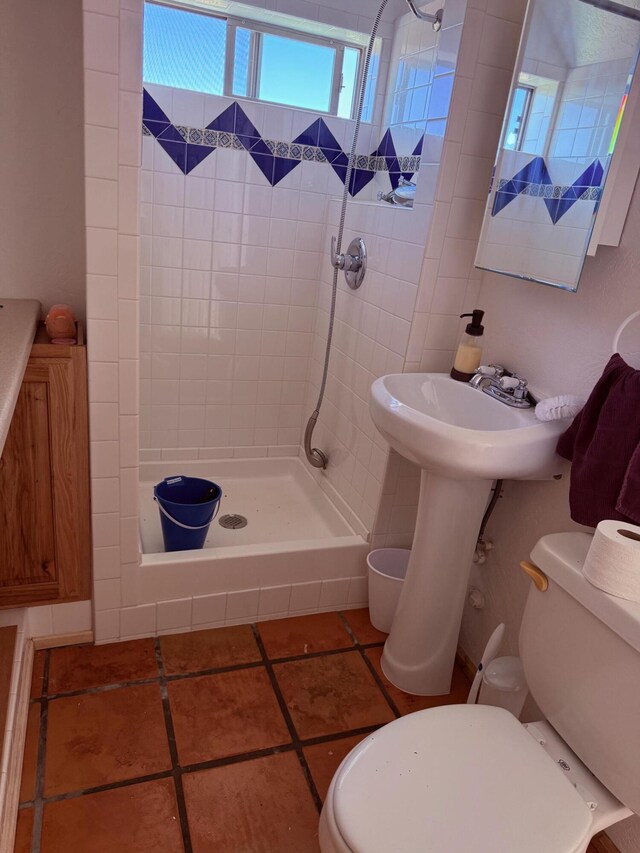 403 Candy Kitchen Rd, Ramah, NM 87321 - full bathroom featuring a stall shower, toilet, and tile patterned flooring