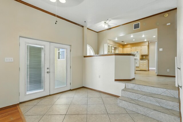 1551 Valley View Dr SW, Los Lunas, NM 87031 - entryway featuring baseboards, stairs, light tile patterned floors, and crown molding