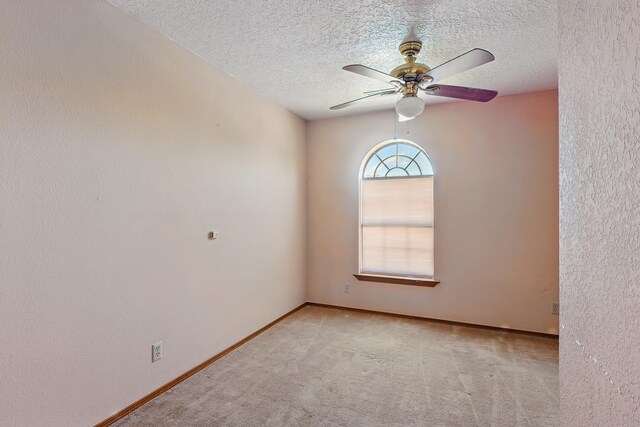 1551 Valley View Dr SW, Los Lunas, NM 87031 - empty room featuring light wood finished floors, a baseboard radiator, a ceiling fan, and baseboards