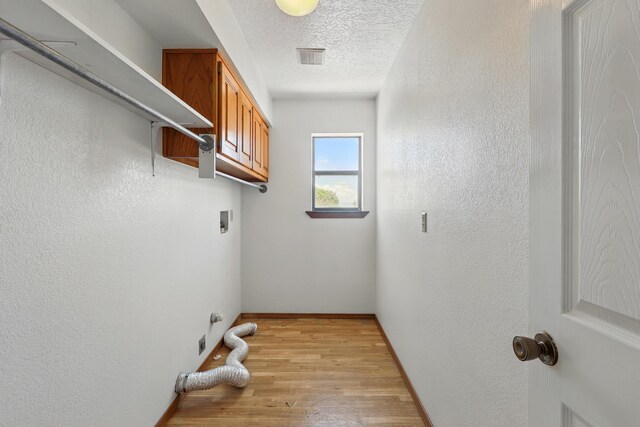 1551 Valley View Dr SW, Los Lunas, NM 87031 - empty room featuring light carpet, a ceiling fan, baseboards, and a textured ceiling