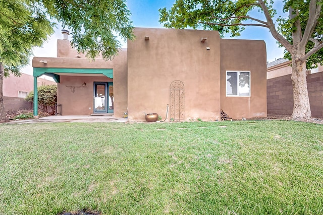 7623 Vista Alta Rd NW, Albuquerque, NM 87114 - southwest-style home with stucco siding