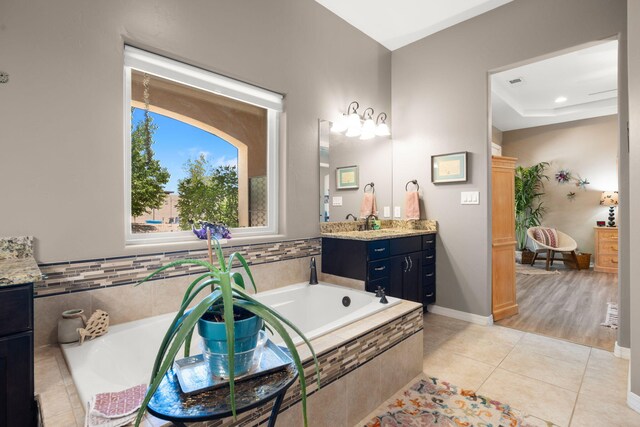 2633 Globe Ct NE, Rio Rancho, NM 87124 - full bathroom featuring vanity, tile patterned floors, a bath, and recessed lighting