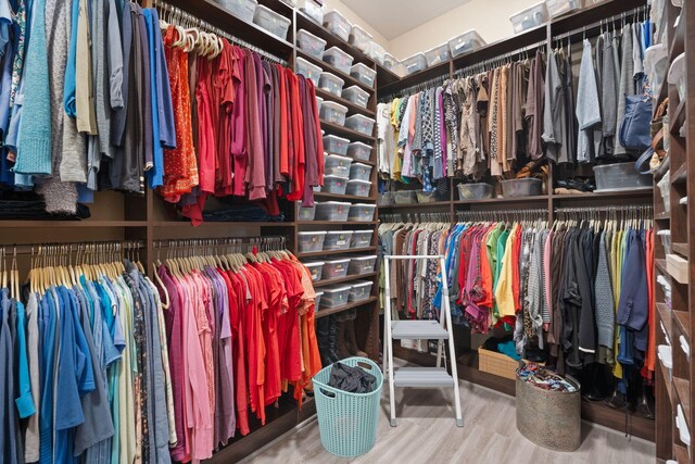 2633 Globe Ct NE, Rio Rancho, NM 87124 - walk in closet featuring wood finished floors
