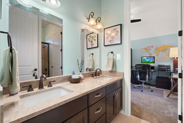 2633 Globe Ct NE, Rio Rancho, NM 87124 - full bath featuring double vanity and a shower