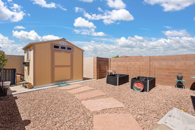 2633 Globe Ct NE, Rio Rancho, NM 87124 - view of shed with a fenced backyard