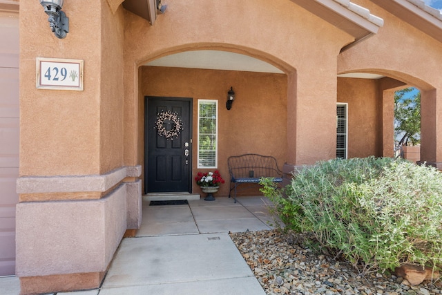 429 Paseo Vista Loop NE, Rio Rancho, NM 87124 - doorway to property with stucco siding