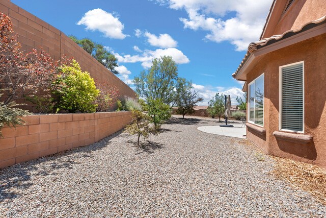 429 Paseo Vista Loop NE, Rio Rancho, NM 87124 - fenced backyard with a patio