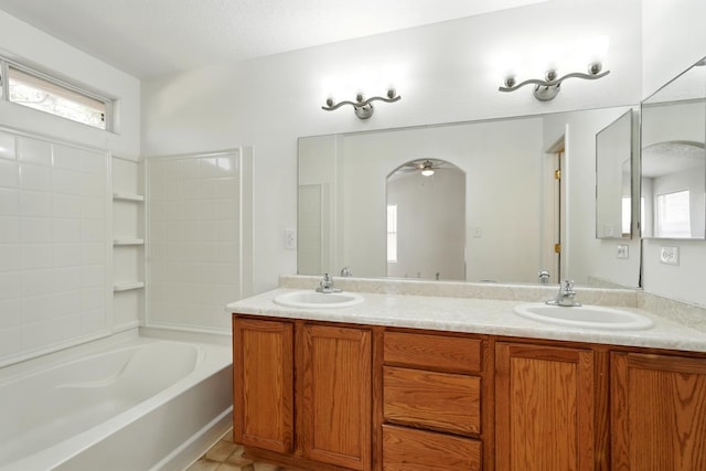 5940 Night Rose Ave NW, Albuquerque, NM 87114 - full bath with a ceiling fan and double vanity