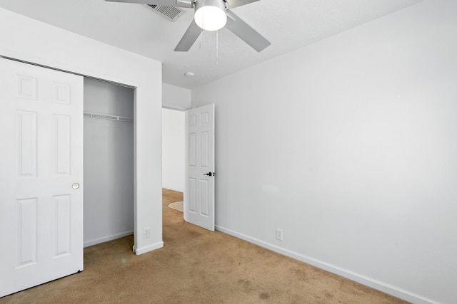 5940 Night Rose Ave NW, Albuquerque, NM 87114 - unfurnished bedroom featuring carpet flooring, a closet, baseboards, and ceiling fan