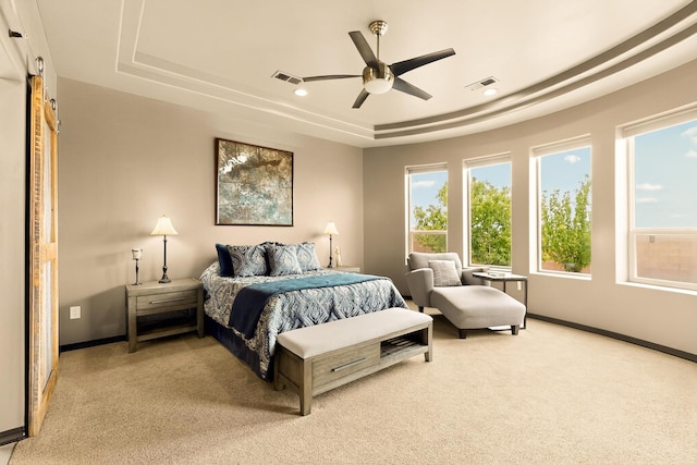 3220 Vatapa Rd NE, Rio Rancho, NM 87144 - bedroom featuring a raised ceiling, light colored carpet, baseboards, recessed lighting, and a ceiling fan