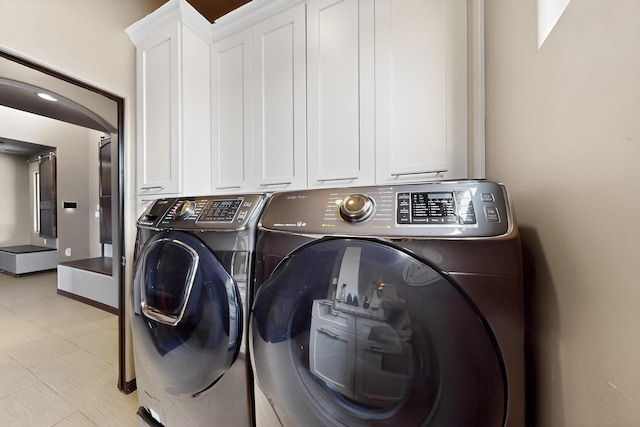 3220 Vatapa Rd NE, Rio Rancho, NM 87144 - laundry room featuring independent washer and dryer and cabinet space