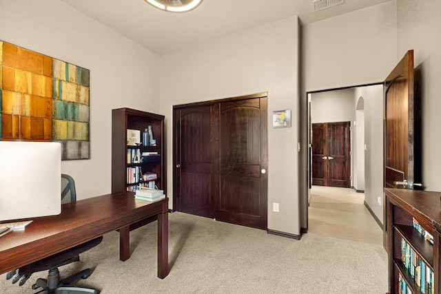 3220 Vatapa Rd NE, Rio Rancho, NM 87144 - office area featuring light colored carpet and arched walkways