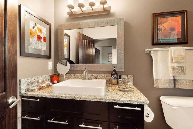 3220 Vatapa Rd NE, Rio Rancho, NM 87144 - half bathroom with vanity and toilet