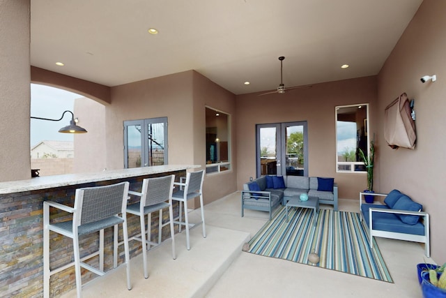 3220 Vatapa Rd NE, Rio Rancho, NM 87144 - dining room featuring french doors, arched walkways, recessed lighting, and a ceiling fan