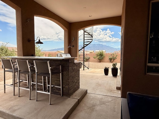 3220 Vatapa Rd NE, Rio Rancho, NM 87144 - view of patio / terrace featuring a mountain view