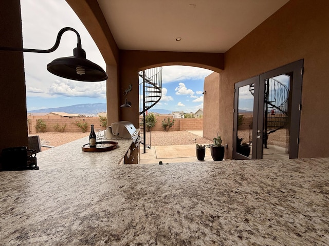 3220 Vatapa Rd NE, Rio Rancho, NM 87144 - fenced backyard with a patio