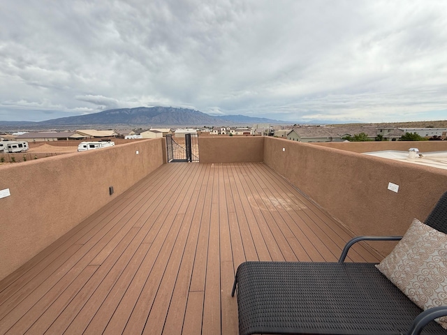 3220 Vatapa Rd NE, Rio Rancho, NM 87144 - deck featuring a mountain view