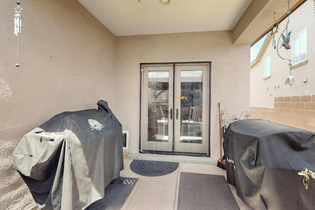 1720 Summer Breeze Dr NW, Albuquerque, NM 87120 - property entrance with french doors and stucco siding