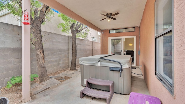 11041 Academy Ridge Rd NE, Albuquerque, NM 87111 - view of patio featuring a hot tub and a ceiling fan