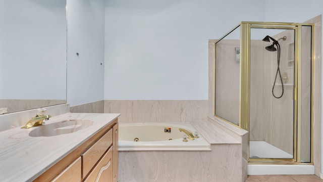 11041 Academy Ridge Rd NE, Albuquerque, NM 87111 - full bathroom featuring a stall shower, vanity, a jetted tub, and tile patterned flooring