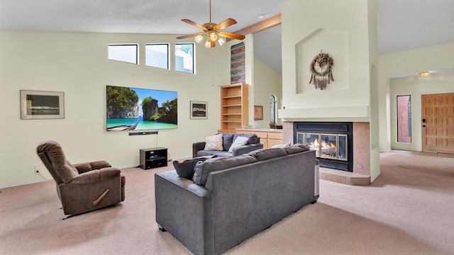 11041 Academy Ridge Rd NE, Albuquerque, NM 87111 - living area featuring light carpet, high vaulted ceiling, a tiled fireplace, ceiling fan, and baseboards