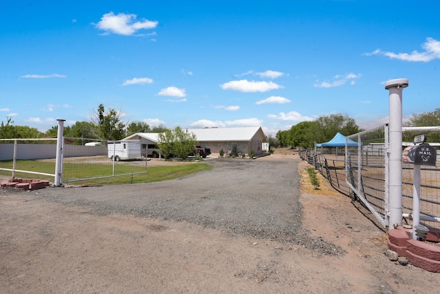 185 La Entrada Rd, Los Lunas, NM 87031 - view of dirt / gravel road featuring a gated entry