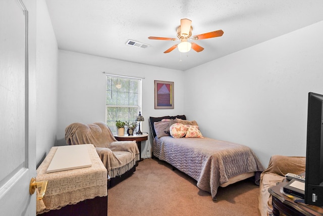 185 La Entrada Rd, Los Lunas, NM 87031 - bedroom with light colored carpet and ceiling fan