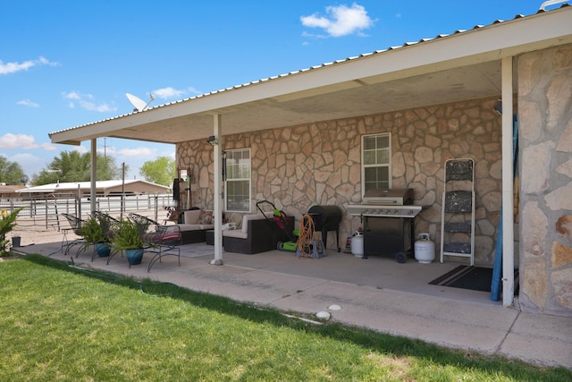 185 La Entrada Rd, Los Lunas, NM 87031 - view of patio / terrace with grilling area and an outdoor living space