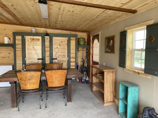 10 Berkshire Rd, Estancia, NM 87016 - dining room with concrete floors and wooden walls