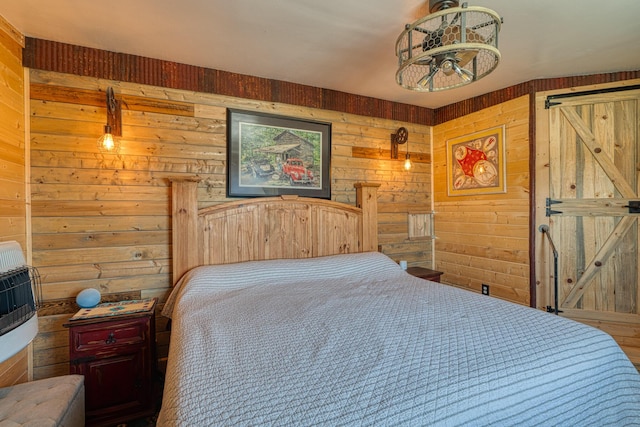 10 Berkshire Rd, Estancia, NM 87016 - bedroom featuring wood walls