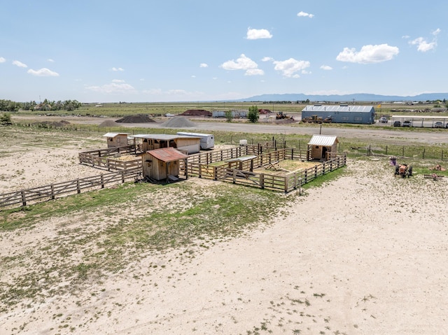 10 Berkshire Rd, Estancia, NM 87016 - view of yard with a view of countryside, an exterior structure, an outdoor structure, and a mountain view