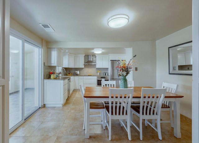 1201 Calle Placitas, Bernalillo, NM 87004 - dining space featuring light tile patterned floors
