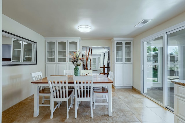 1201 Calle Placitas, Bernalillo, NM 87004 - dining area featuring light tile patterned floors and baseboards