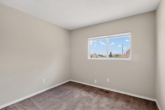 4001 Cresta Park Ave NW, Albuquerque, NM 87114 - spare room with carpet flooring and a textured ceiling