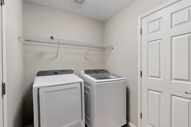 4001 Cresta Park Ave NW, Albuquerque, NM 87114 - washroom with washer and clothes dryer